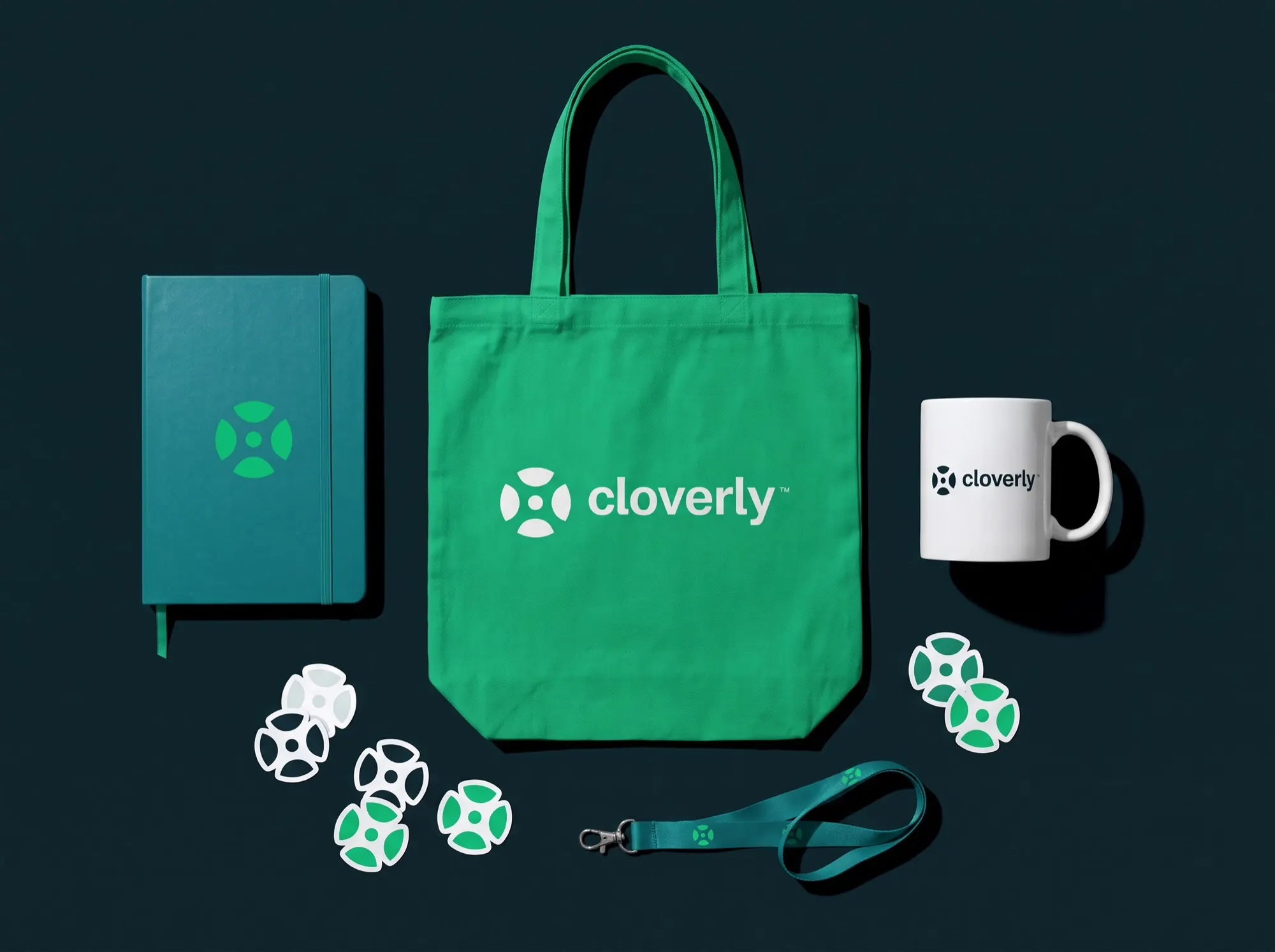 Merch kit: tote, notebook, mug, stickers.